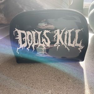 Dollskill patent logo makeup bag